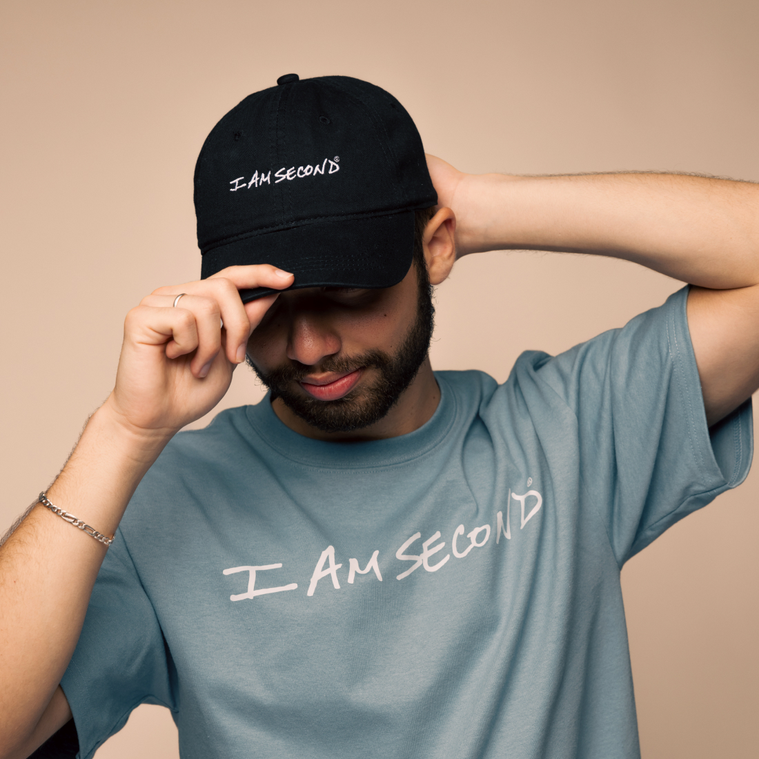 man wearing a twill cap